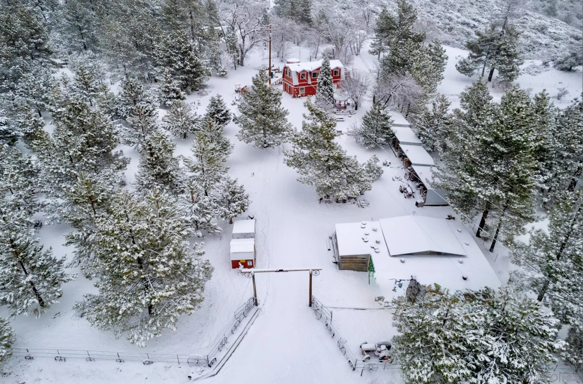 an aerial view of residential house with outdoor space