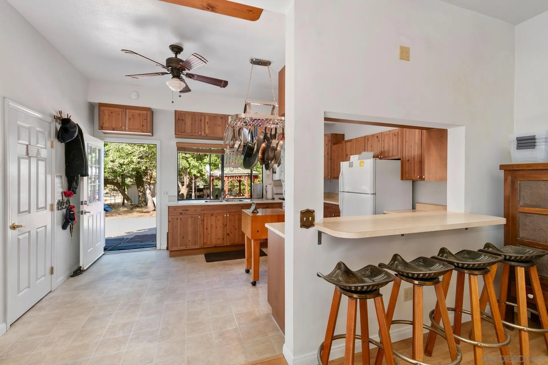 8203 Morris Ranch Road Pine Valley, CA 91962 - Photo 13 of 42 a living room with furniture and a large window