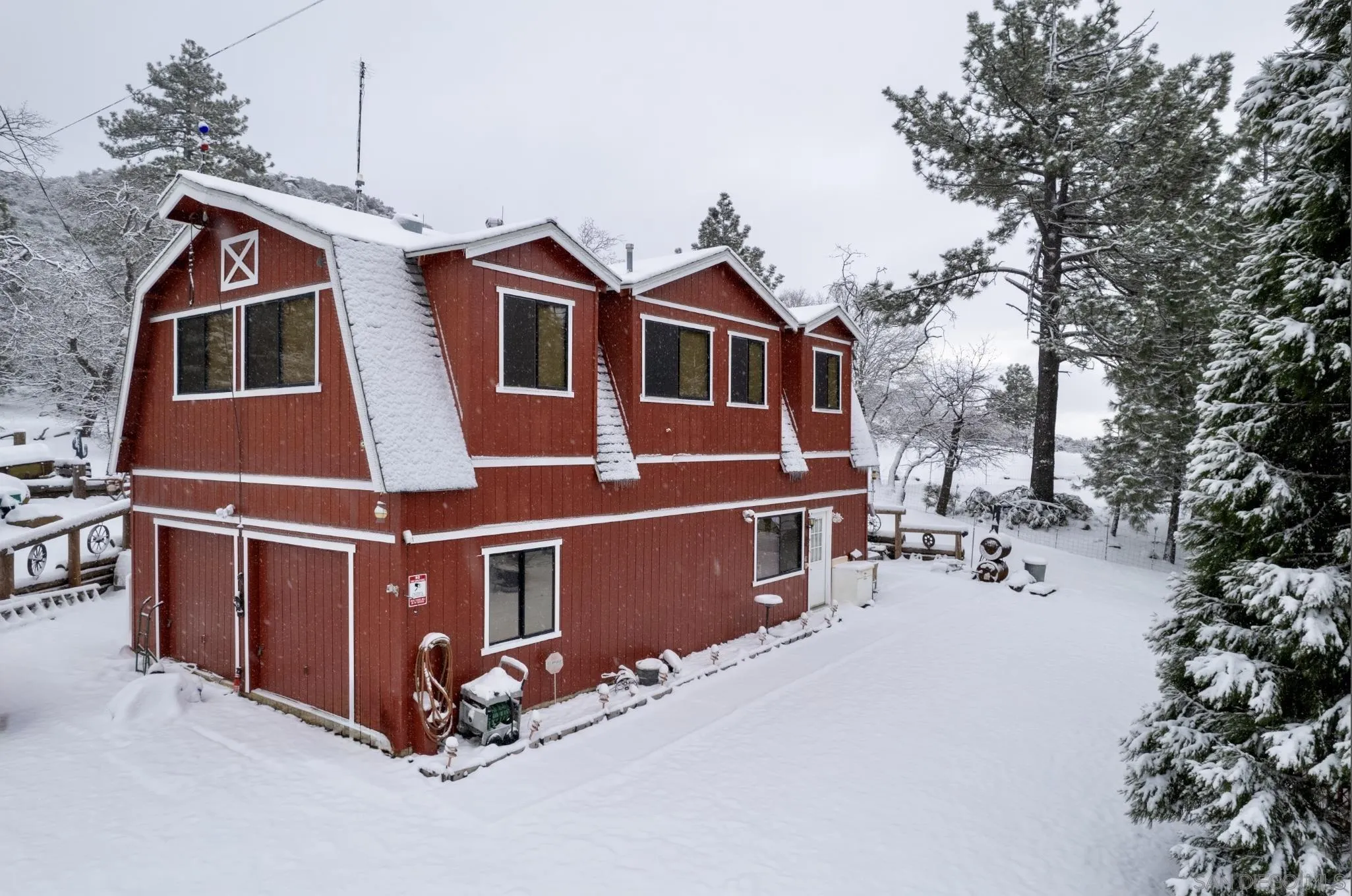 8203 Morris Ranch Road Pine Valley, CA 91962 - Photo 3 of 42 a view of a small house with wooden fence