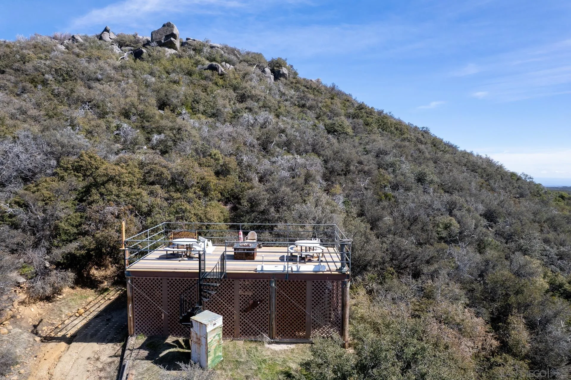 8203 Morris Ranch Road Pine Valley, CA 91962 - Photo 35 of 42 a view of a terrace with a table and chairs