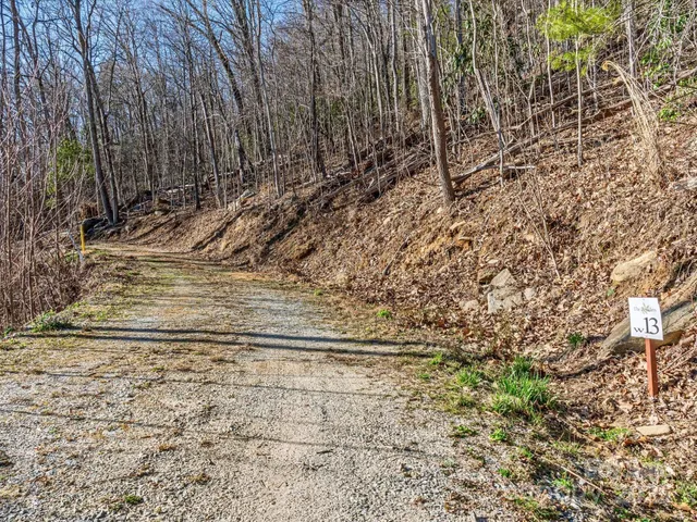 a view of outdoor space with wooden fence