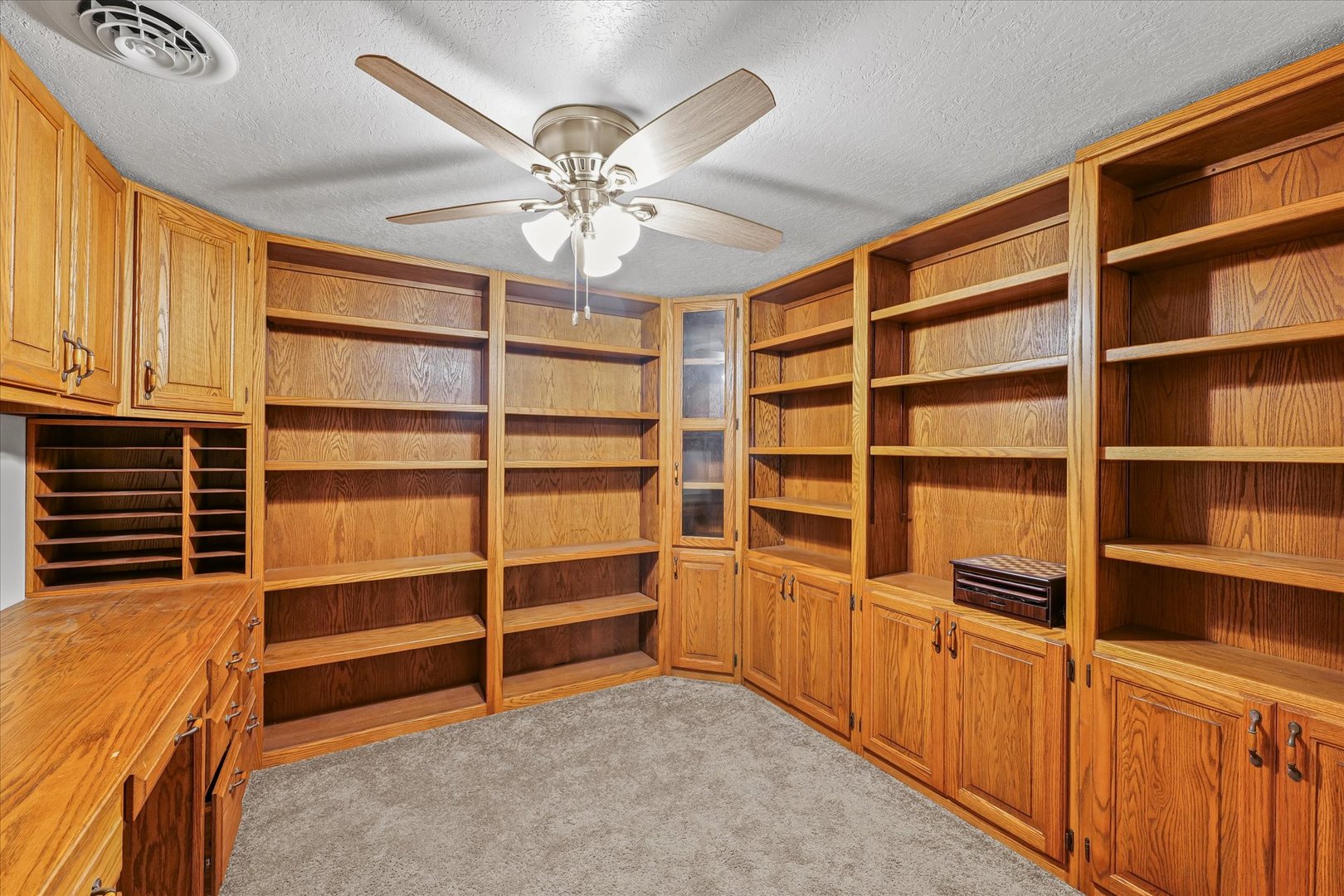16322 Shangri La Road Oakwood, IL 61858 - Photo 11 of 42 a view of an empty room with empty shelves