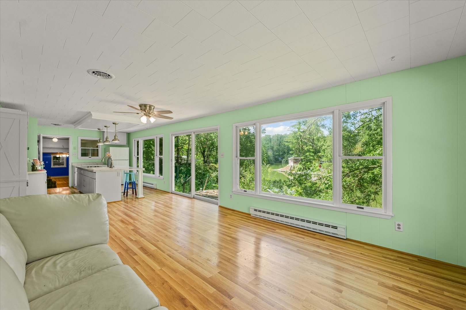 16322 Shangri La Road Oakwood, IL 61858 - Photo 29 of 42 a living room with furniture and large windows