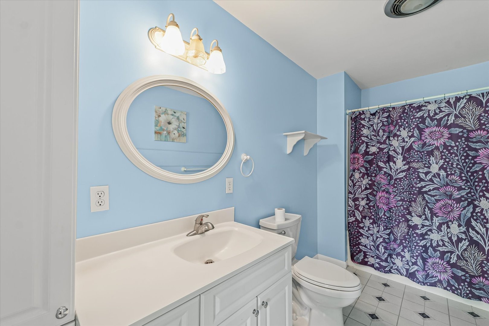16322 Shangri La Road Oakwood, IL 61858 - Photo 30 of 42 a bathroom with a toilet a sink and a mirror