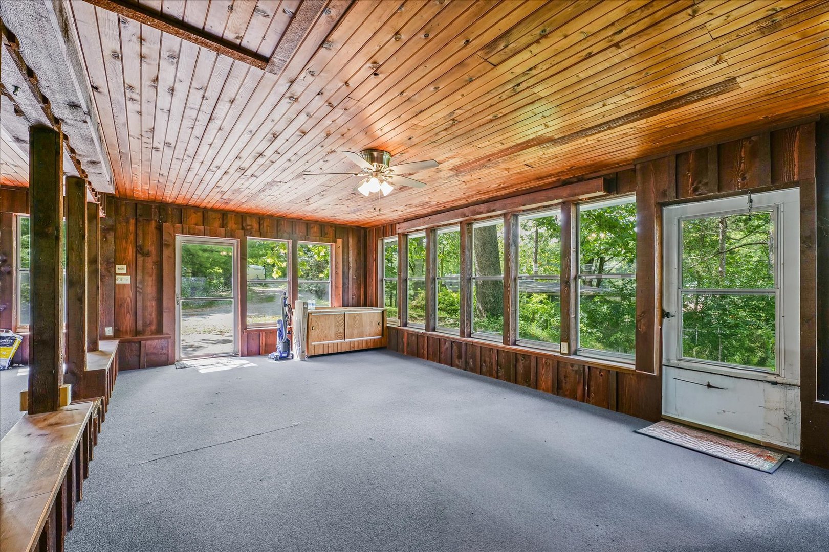 16322 Shangri La Road Oakwood, IL 61858 - Photo 32 of 42 a big room with wooden walls and balcony
