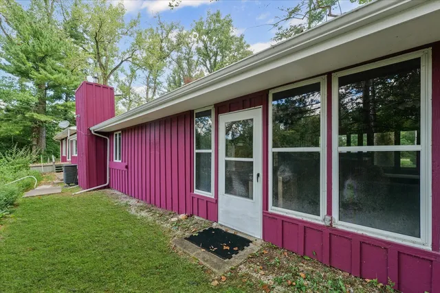 a view of backyard with porch