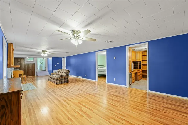 a view of livingroom with furniture and wooden floor