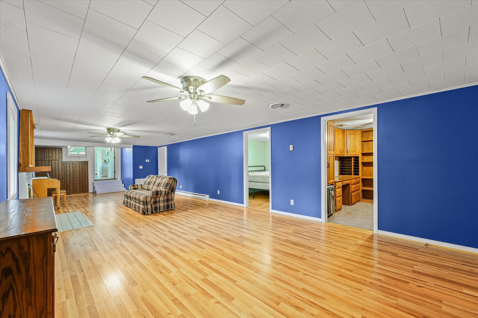 16322 Shangri La Road Oakwood, IL 61858 - Photo 7 of 42 a view of livingroom with furniture and wooden floor