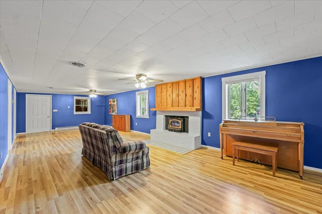 a view of an empty room with empty shelves