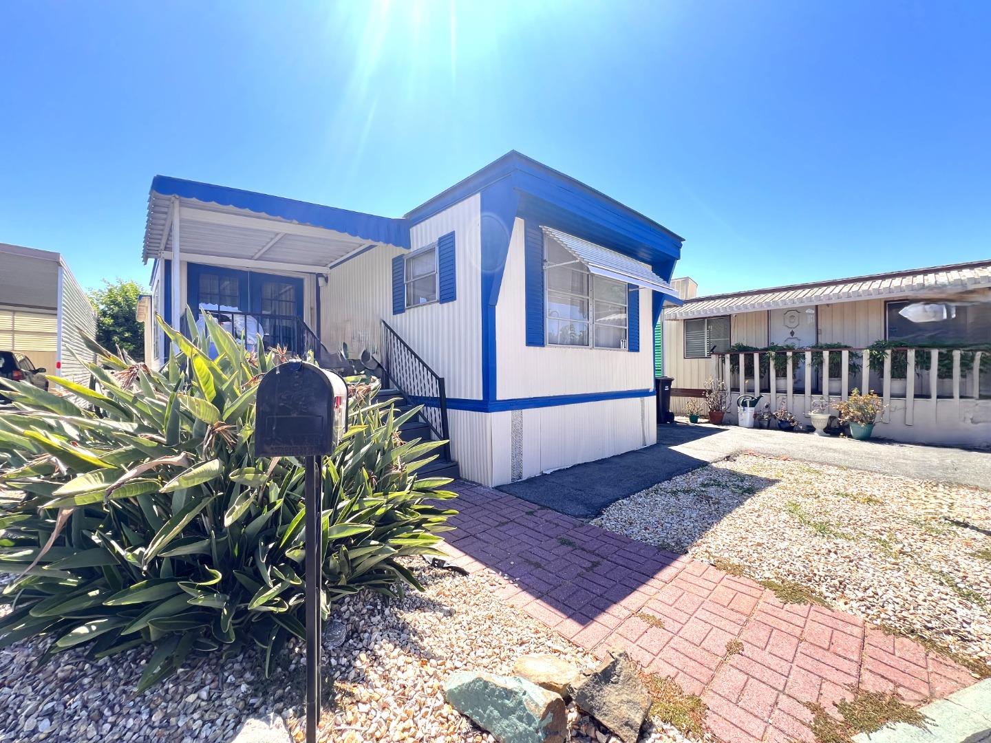 a house view with a backyard space