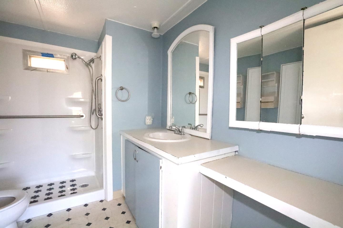 60 Wilson Way, Unit 70 Milpitas, CA 95035 - Photo 12 of 20 a bathroom with a sink and a mirror