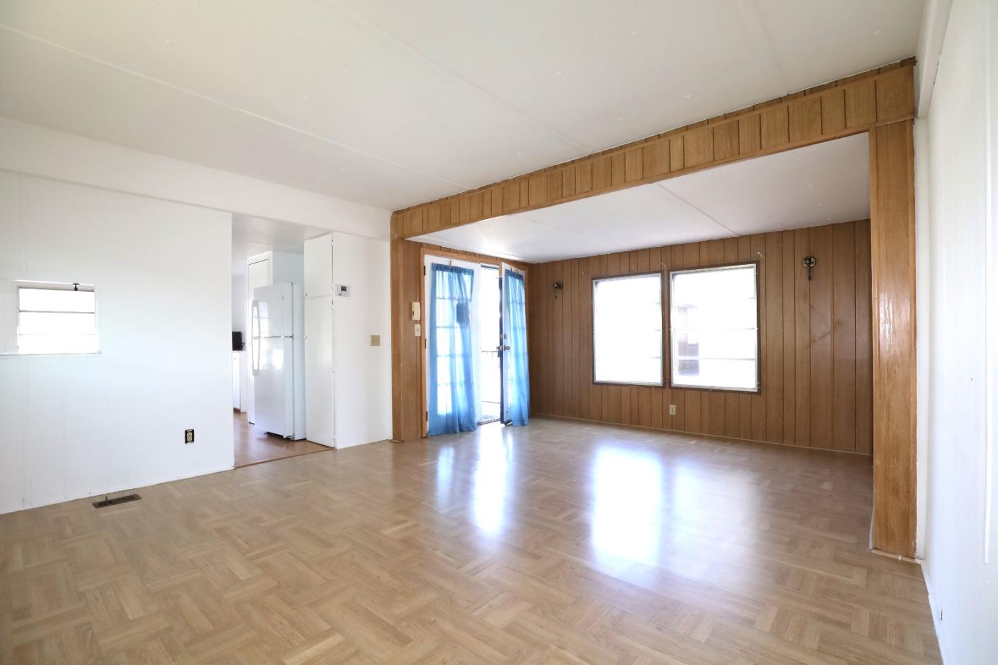 60 Wilson Way, Unit 70 Milpitas, CA 95035 - Photo 4 of 20 a view of an empty room with window and wooden floor