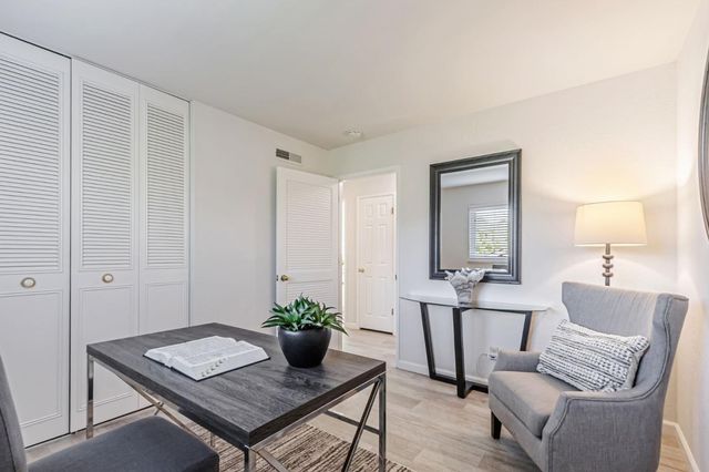 a view of a livingroom with furniture