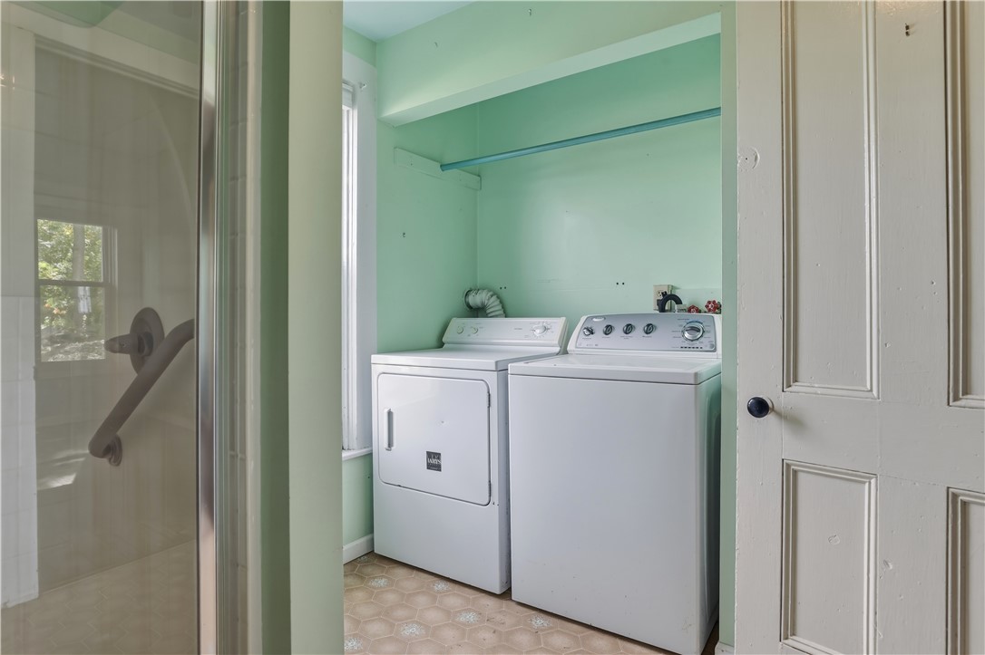 5 Powderhouse Road Corning, NY 14830 - Photo 34 of 47 A dedicated laundry nook features vinyl flooring a