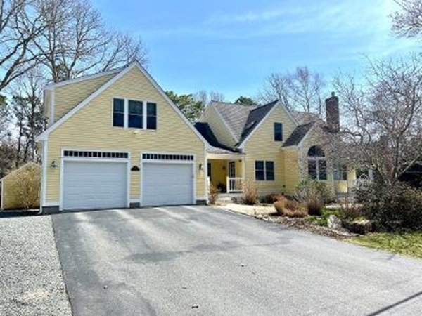 55 Pond Circle Mashpee, MA 02649 - Photo 1 of 30 a view of a house with a outdoor space