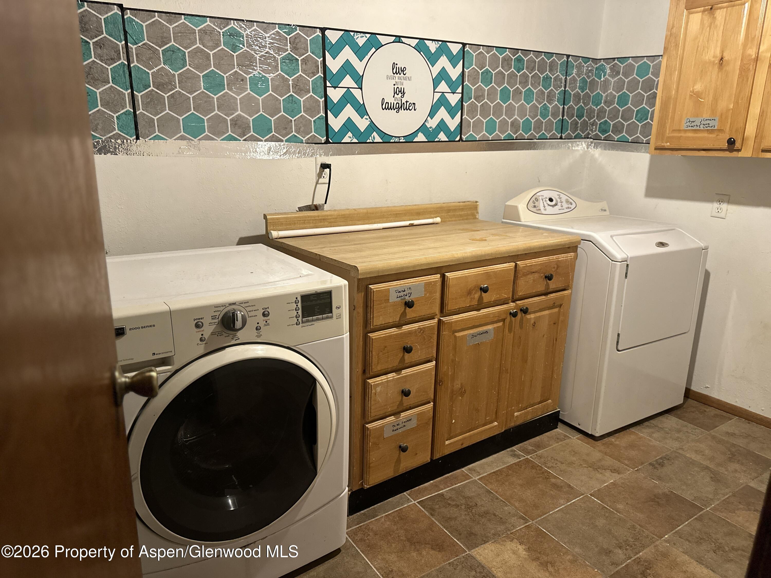 1903 Frontier Drive Craig, CO 81625 - Photo 12 of 16 a utility room with dryer and washer