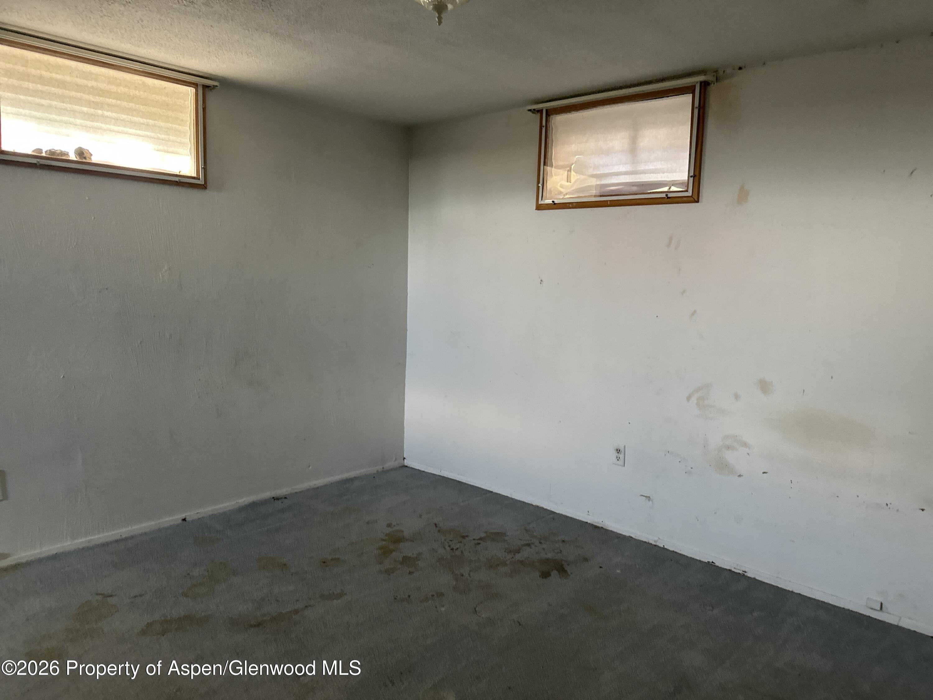 1903 Frontier Drive Craig, CO 81625 - Photo 13 of 16 an empty room with a window