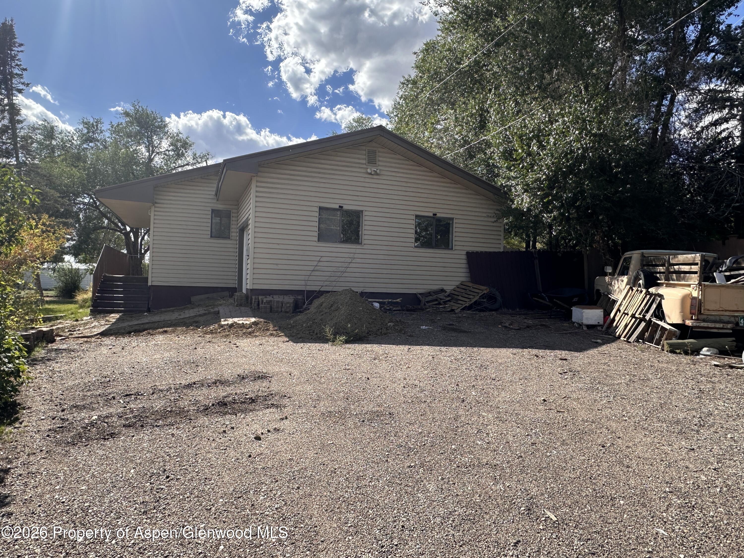 1903 Frontier Drive Craig, CO 81625 - Photo 3 of 16 a view of a house with a yard