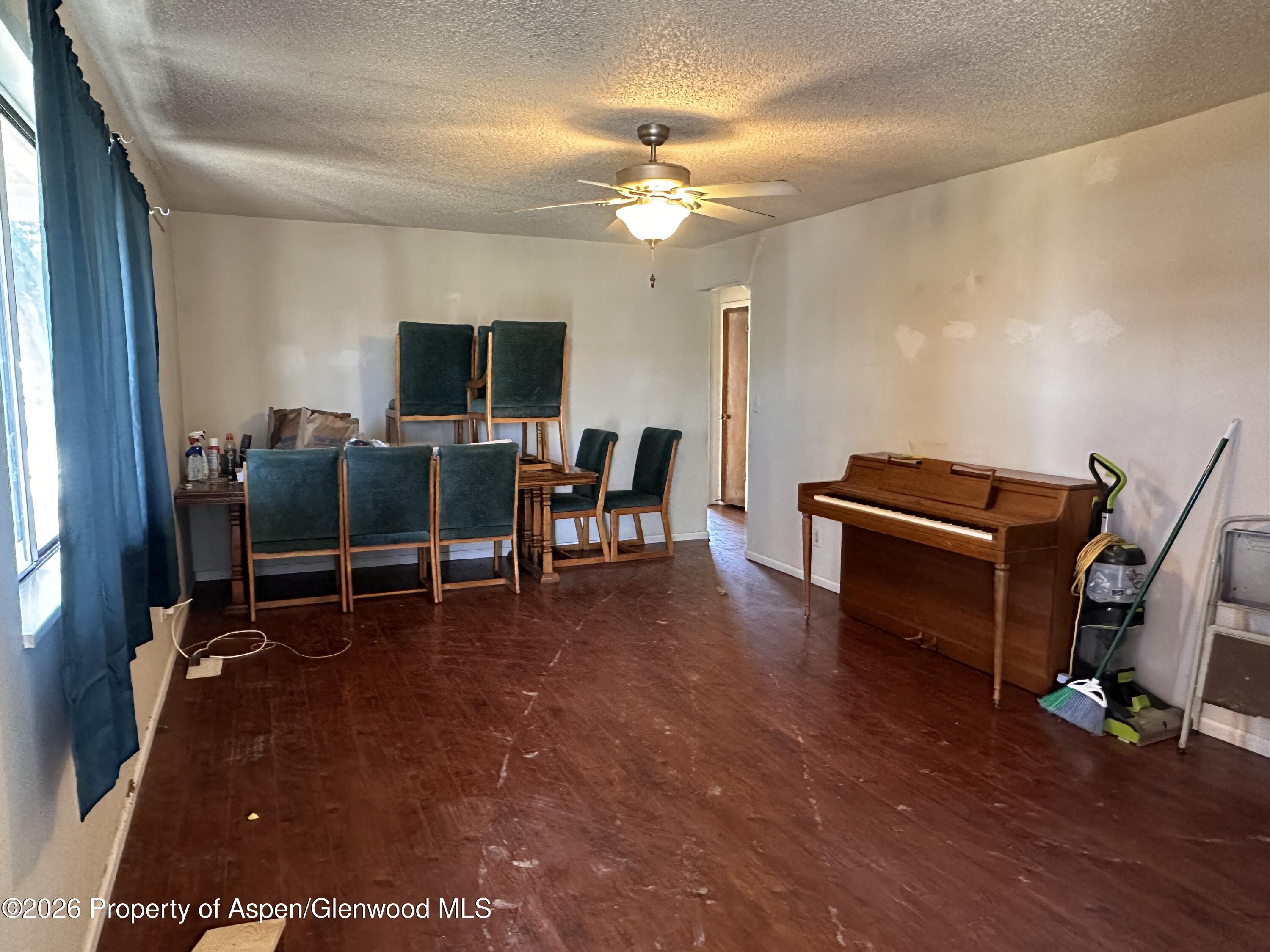1903 Frontier Drive Craig, CO 81625 - Photo 4 of 16 a view of a workspace with furniture and a window
