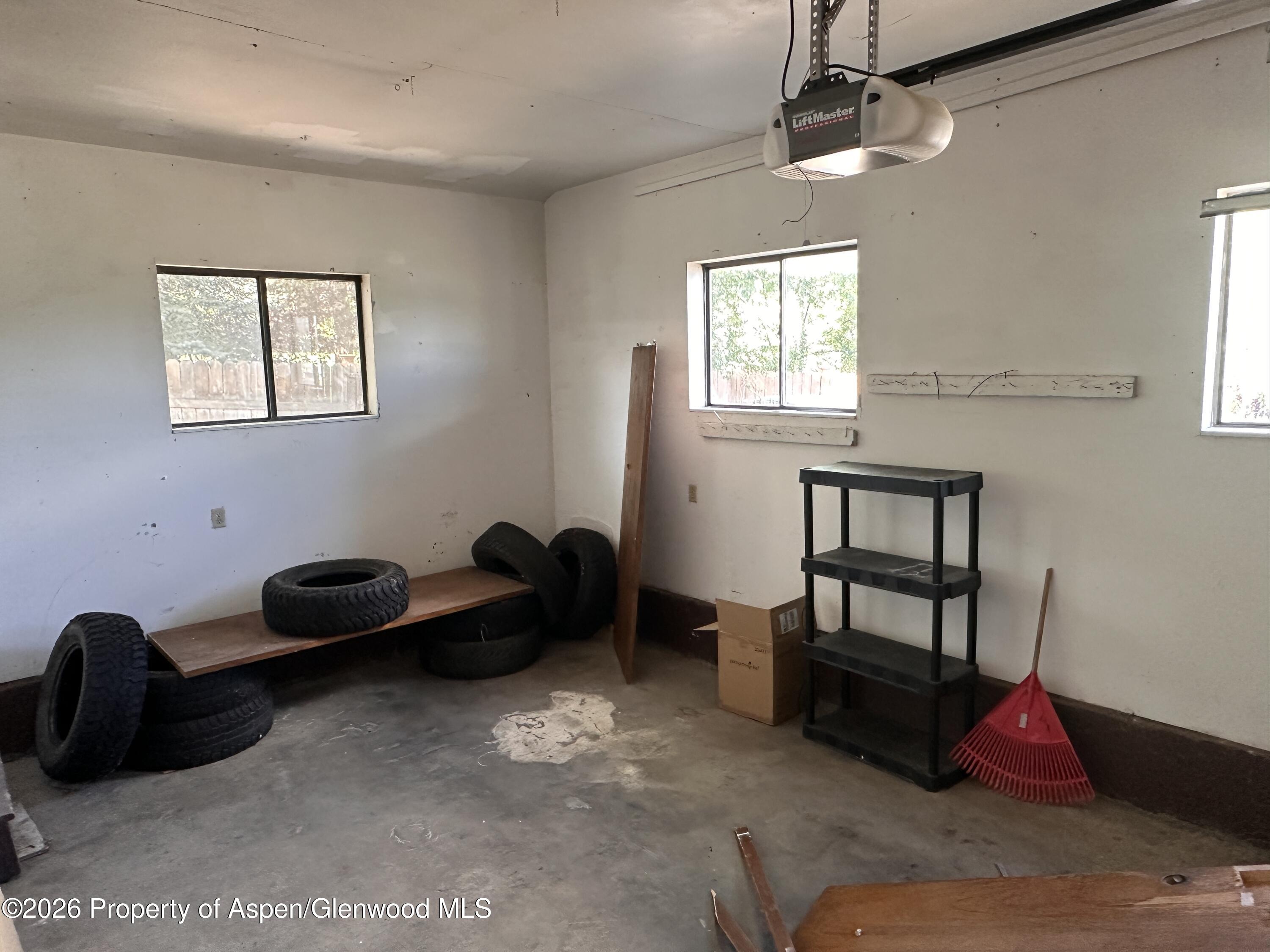 1903 Frontier Drive Craig, CO 81625 - Photo 6 of 16 a bedroom with a bed and a window