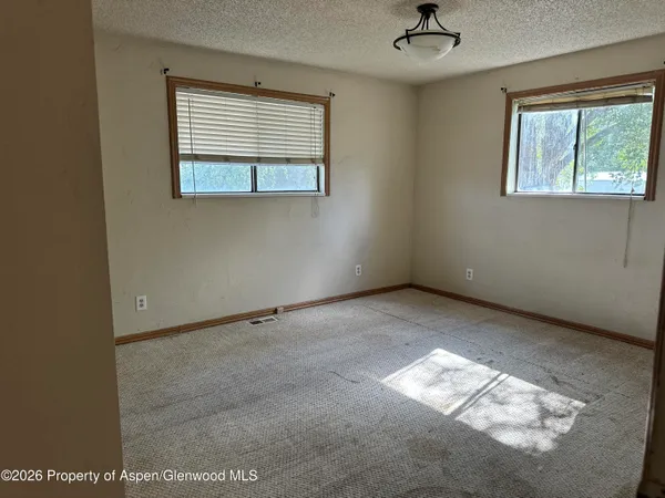 an empty room with a window