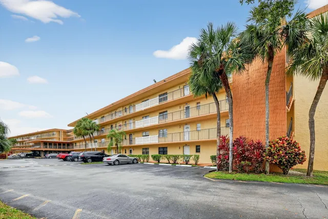 a building with trees in front of it