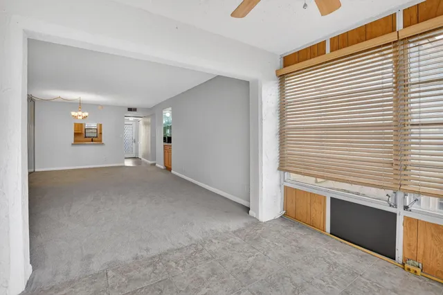 a view of a livingroom with a ceiling fan