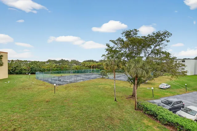 swimming pool view with a outdoor seating