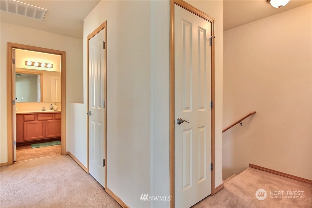 2280 Simmons Street, Unit A DuPont, WA 98327 - Photo 13 of 25 a view of a hallway with a bedroom