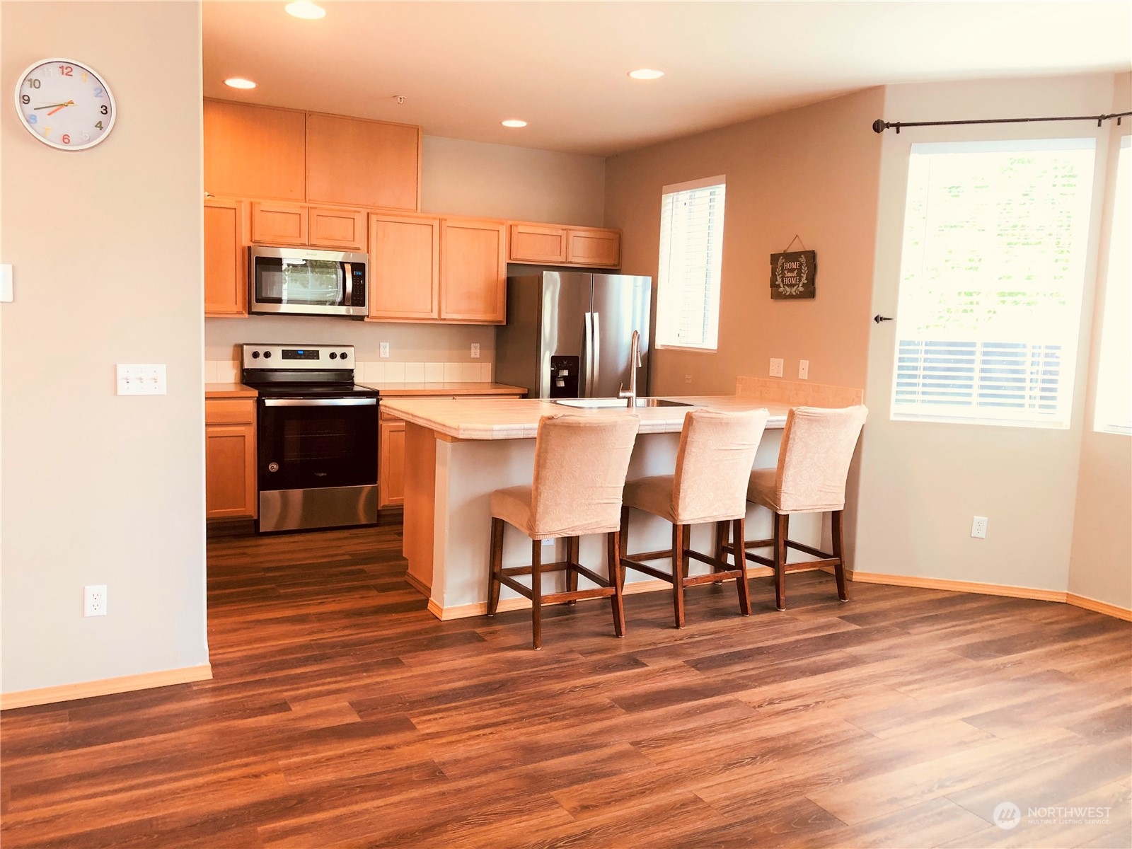 2280 Simmons Street, Unit A DuPont, WA 98327 - Photo 8 of 25 a large kitchen with a table and chairs