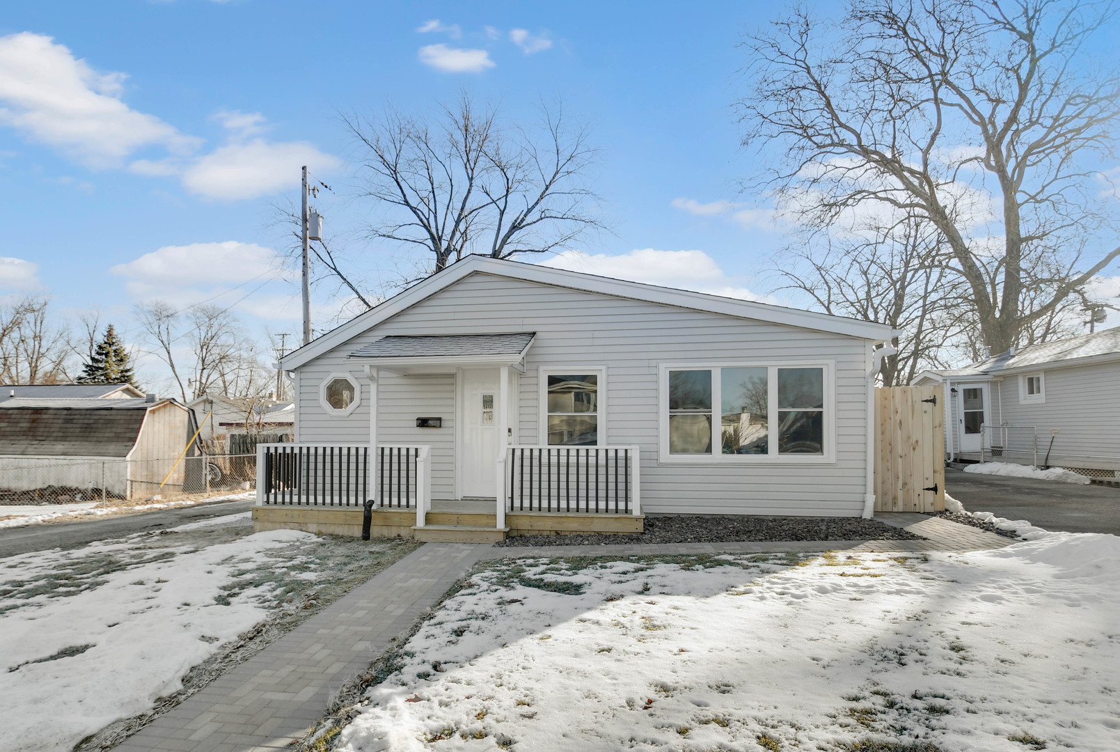 3813 Morgan Street Steger, IL 60475 - Photo 1 of 23 a front view of a house with a yard