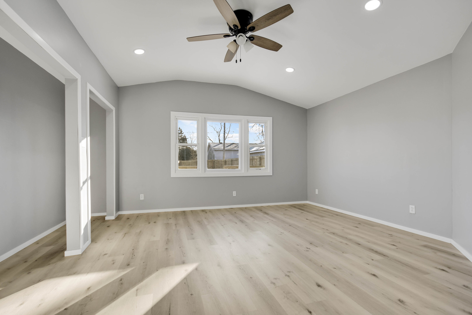 3813 Morgan Street Steger, IL 60475 - Photo 13 of 23 wooden floor in an empty room with a window