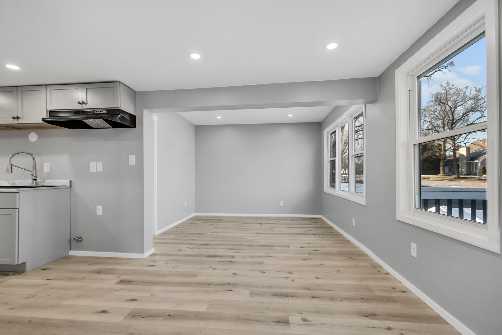 3813 Morgan Street Steger, IL 60475 - Photo 5 of 23 a view of kitchen with stainless steel appliances granite countertop a refrigerator and a stove top oven