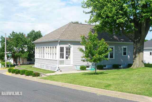 82 Bean Street Road Benton, WI 53803 - Photo 1 of 9 a house that has a tree in front of it