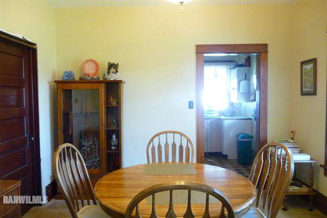 82 Bean Street Road Benton, WI 53803 - Photo 3 of 9 a view of a dining room with furniture and wooden floor