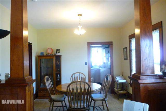 82 Bean Street Road Benton, WI 53803 - Photo 4 of 9 a view of a dining room with furniture and chandelier