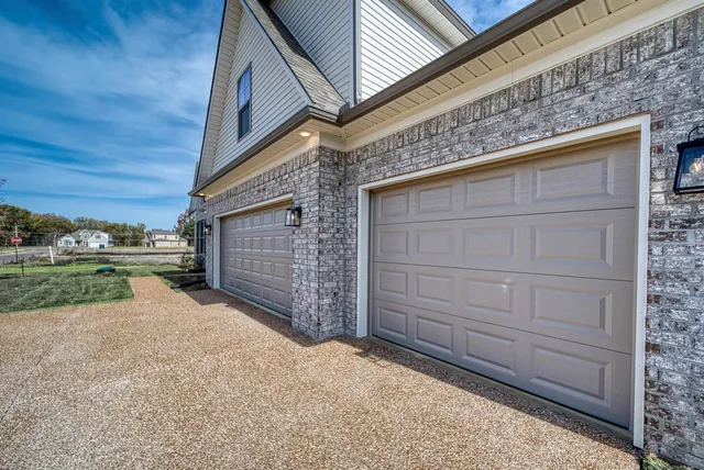 a view of a house door space and wooden deck