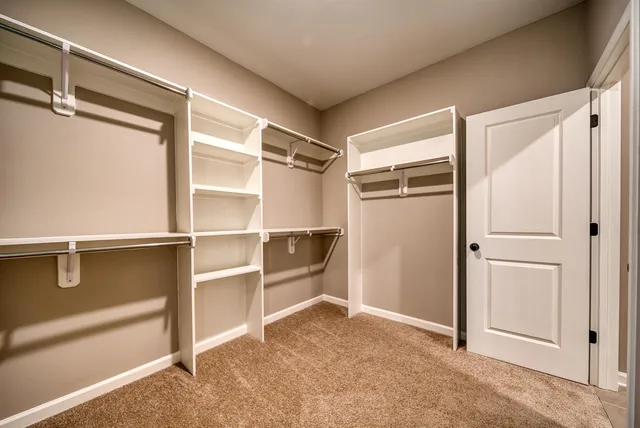 a view of an empty room and a gallery