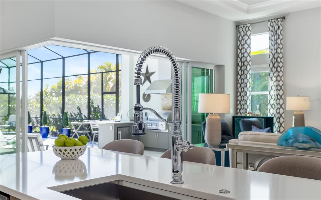 8362 Redonda Loop Bradenton, FL 34202 - Photo 14 of 58 a living room with furniture and a large window