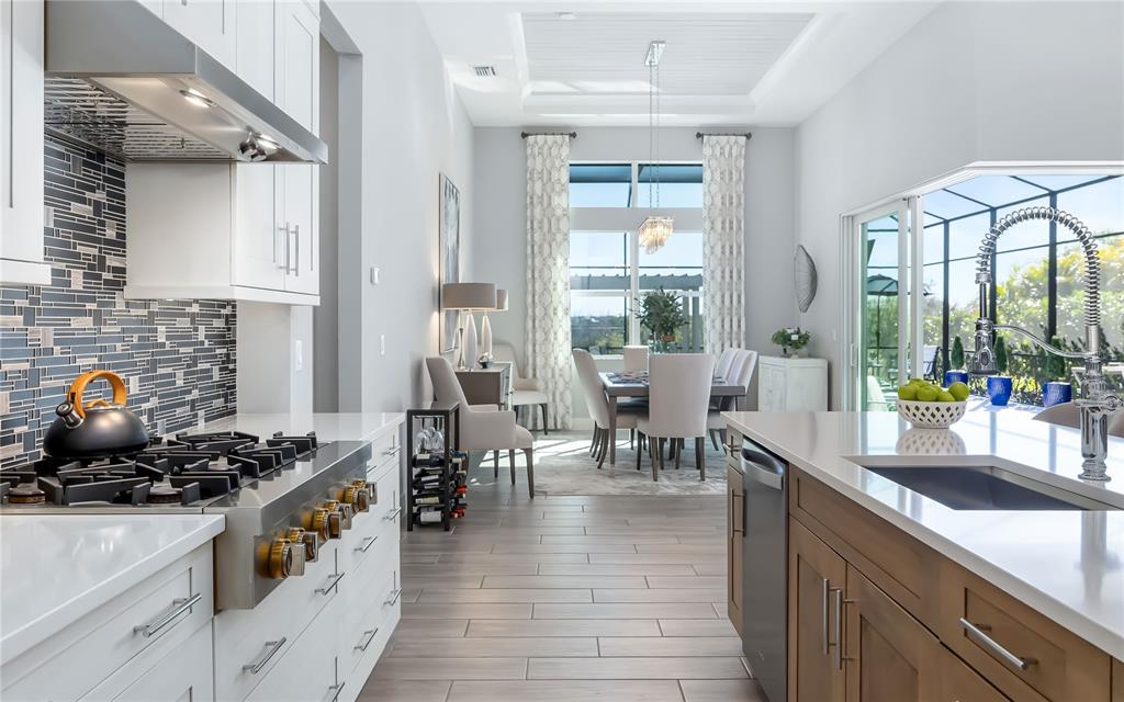 8362 Redonda Loop Bradenton, FL 34202 - Photo 15 of 58 a kitchen with lots of counter top space