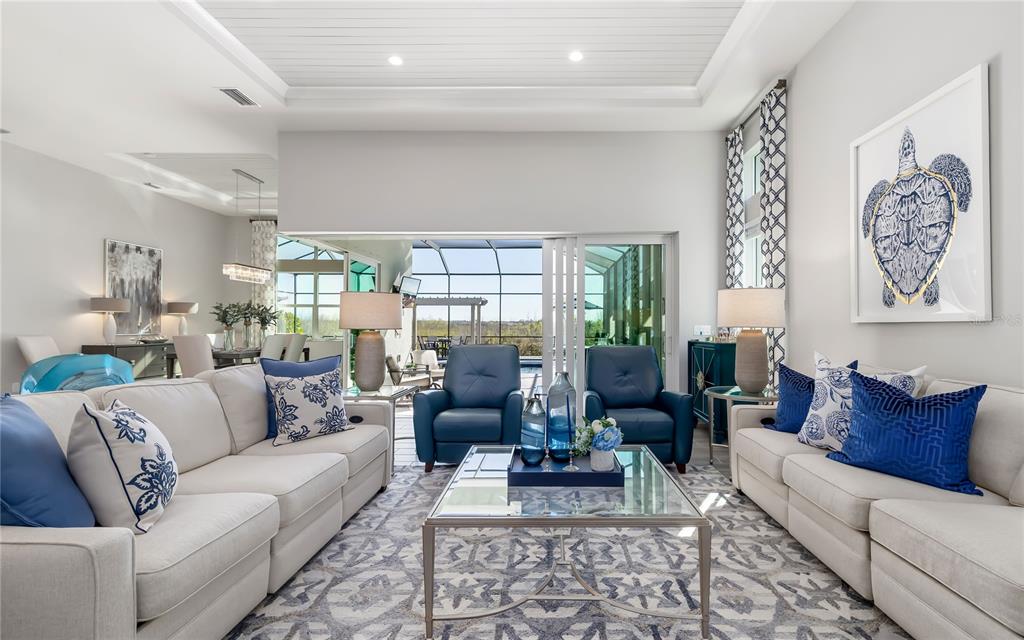 8362 Redonda Loop Bradenton, FL 34202 - Photo 5 of 58 a living room with furniture or couch and a potted plant