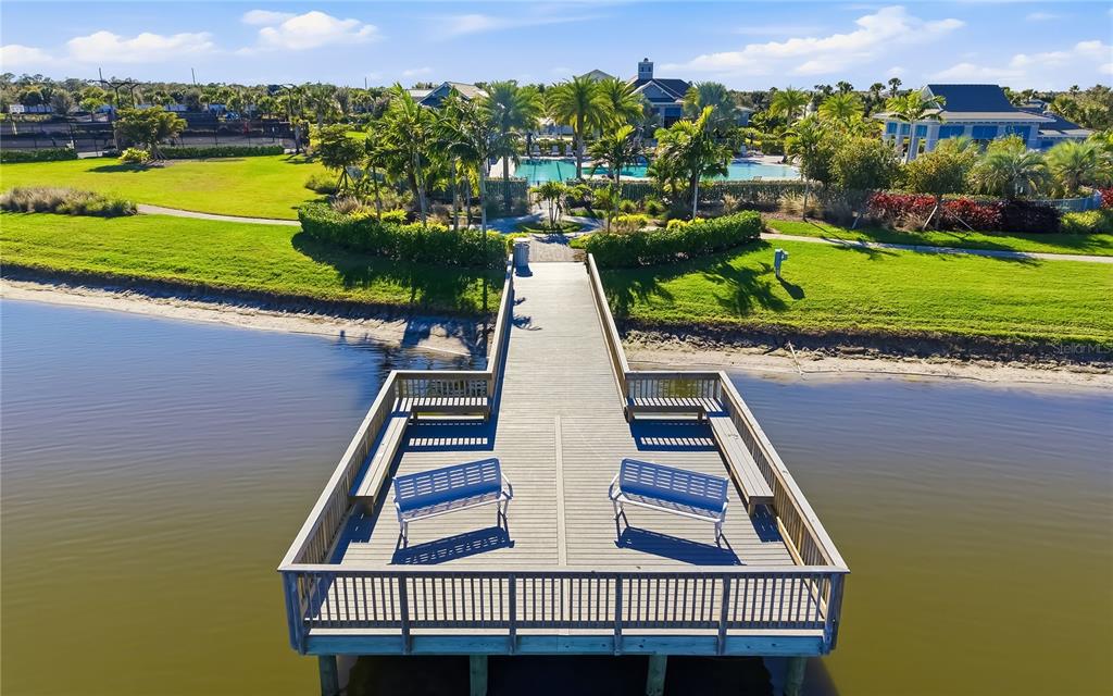 8362 Redonda Loop Bradenton, FL 34202 - Photo 56 of 58 an aerial view of a residential houses with outdoor space and ocean view