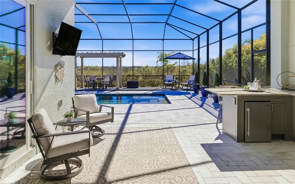 8362 Redonda Loop Bradenton, FL 34202 - Photo 6 of 58 a view of a living room and dining room