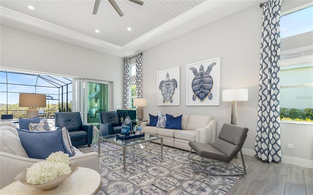 8362 Redonda Loop Bradenton, FL 34202 - Photo 10 of 58 a living room with furniture and a large window