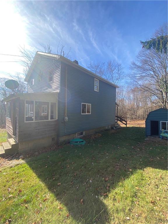 201 Chickasaw Road Templeton, PA 16259 - Photo 6 of 16 a view of a house with a yard