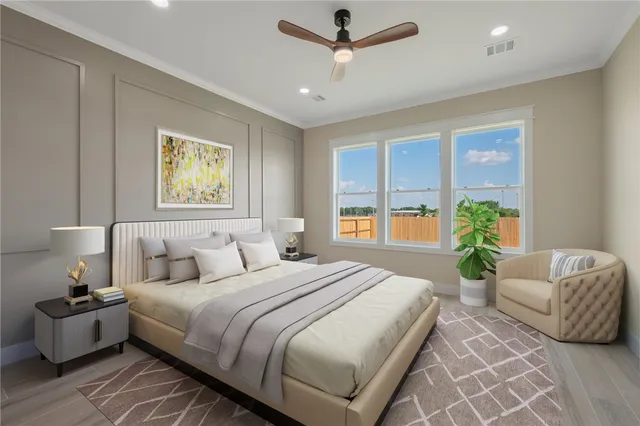 a bedroom with a bed and a couch