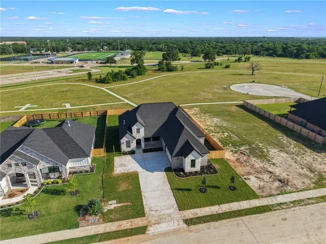 swimming pool view with a lake view