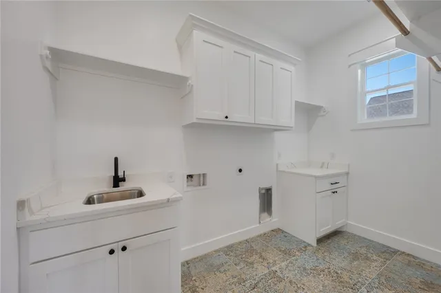 a view of a room with cabinets