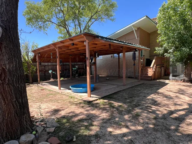 a view of a barn with yard