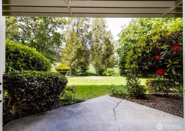 a view of a porch with a yard